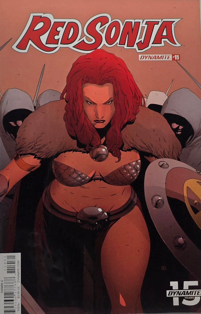 Red Sonja #11 — Cover C (Dynamite — Fierce Close-Up with Fur Cloak & Shield)